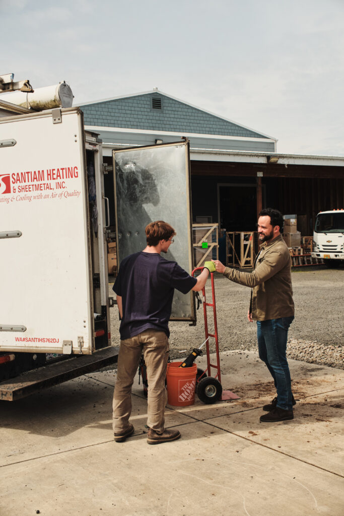 Crew loading materials from shop into truck