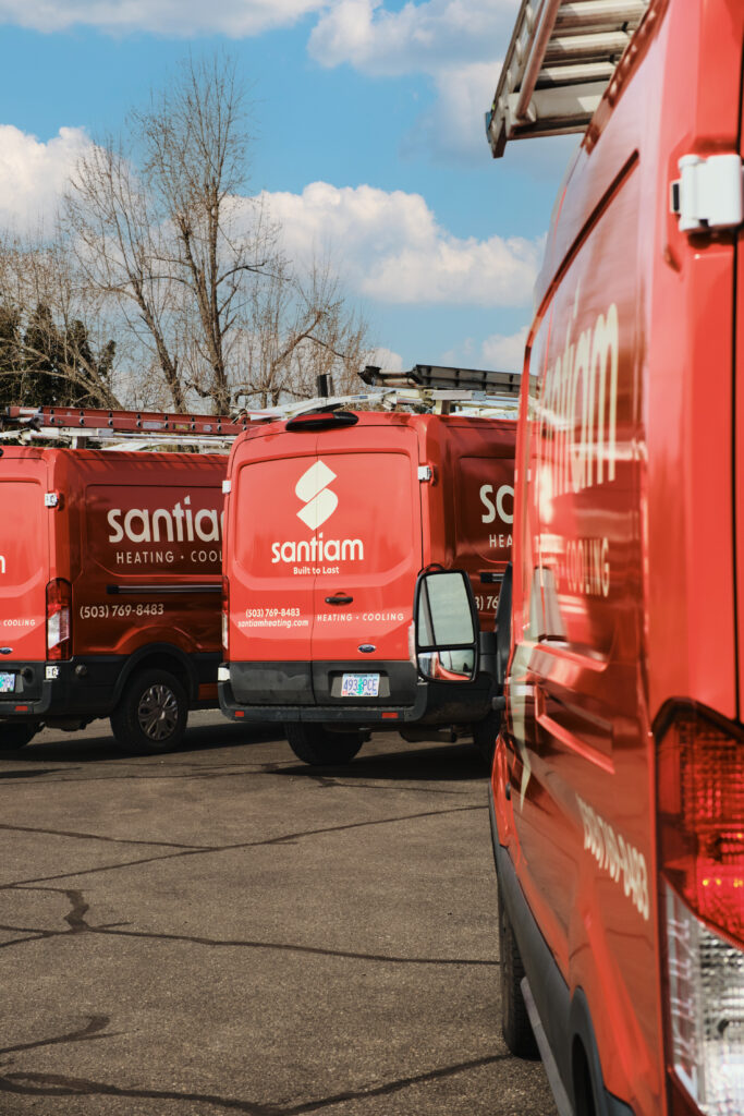 Row of Santiam trucks staged in yard